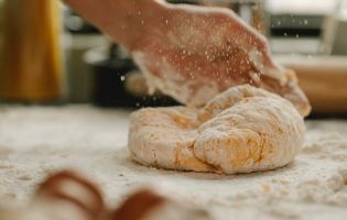 Hands Handling Dough